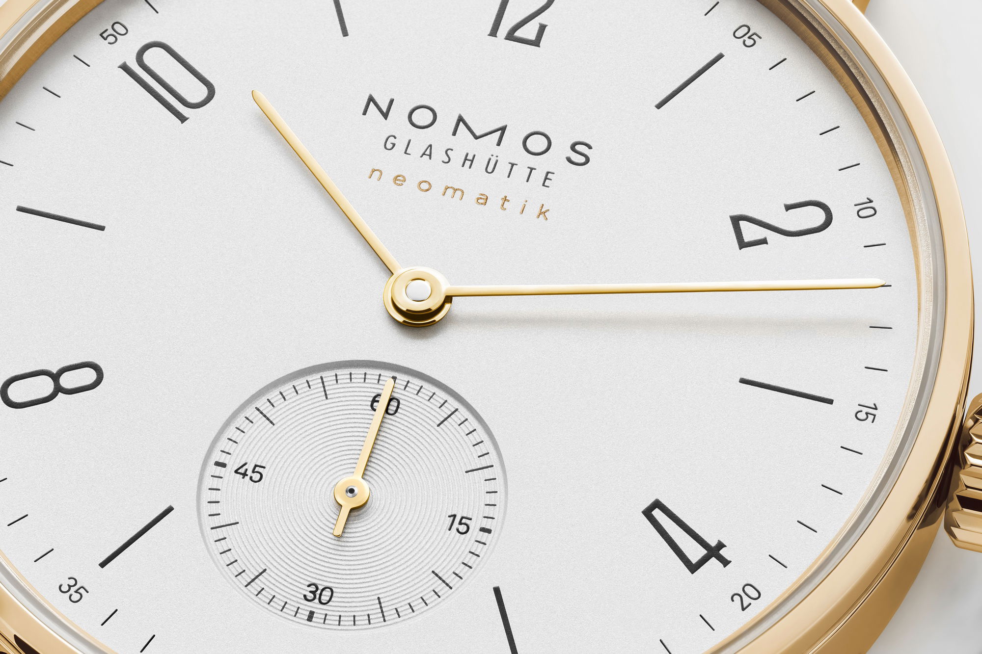 Nomos Glashütte Tangente gold neomatik doré